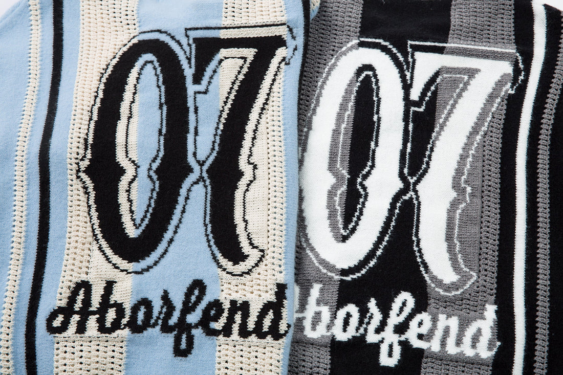 Omirad Varsity Stripe Knit Sweater