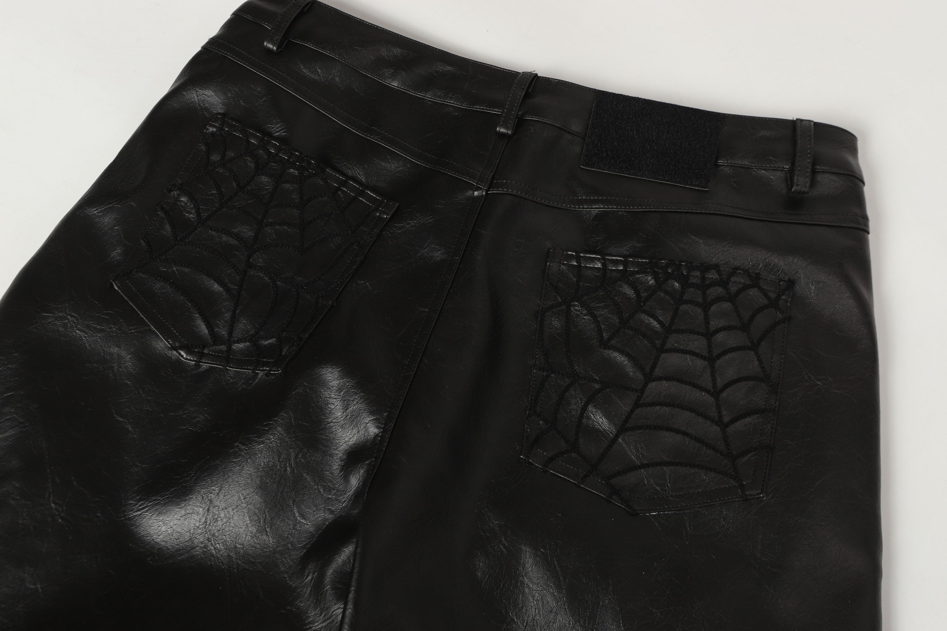 Omirad Web Embossed PU Wide-Leg Pants