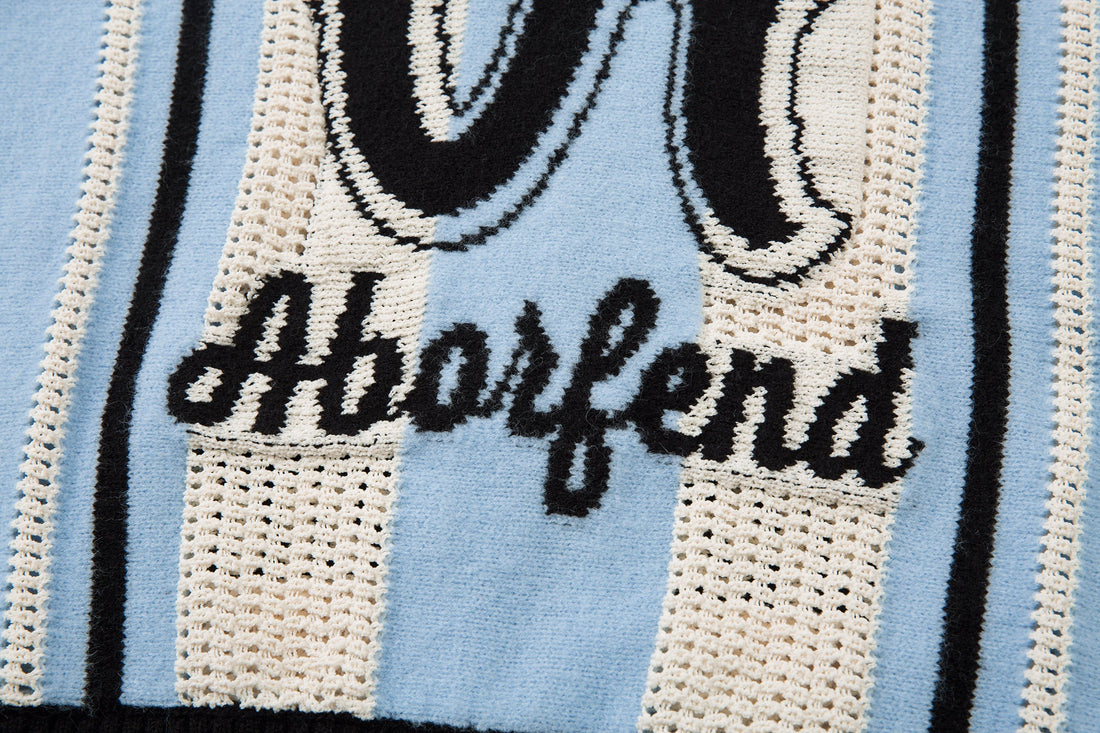 Omirad Varsity Stripe Knit Sweater